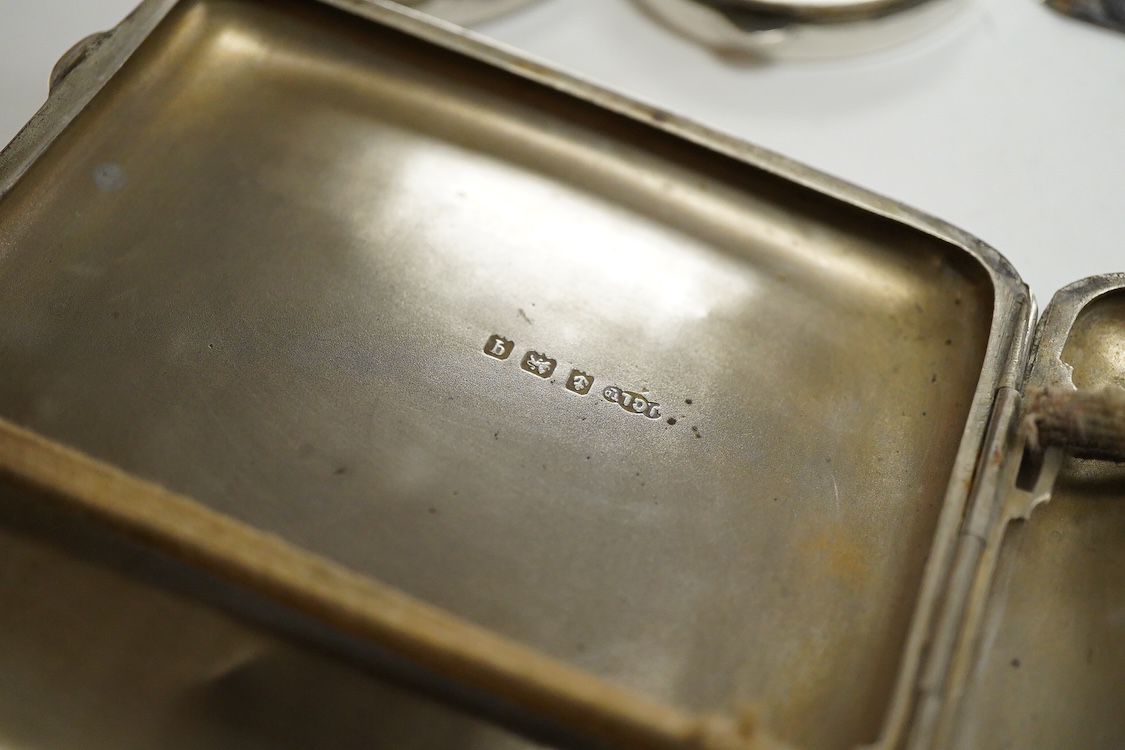 A continental 800 standard oblong shaped dish, of fluted design, together with a Peruvian sterling dish and similar pill box and a George V silver cigarette case, 16.6oz.